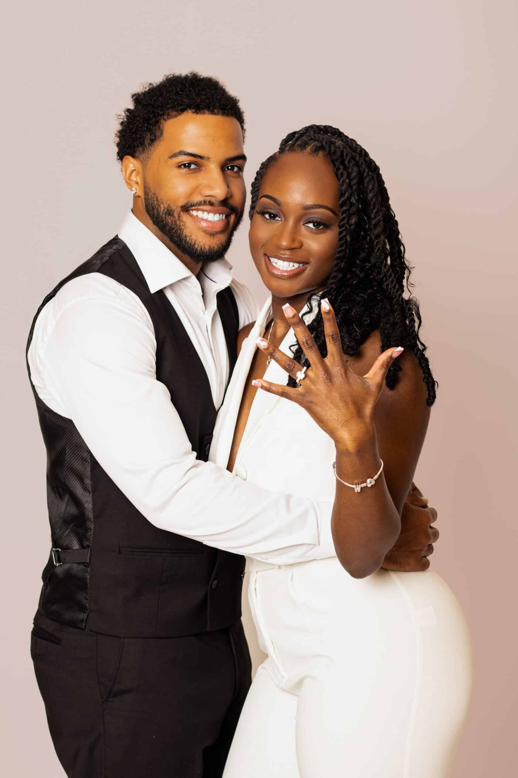 Beautiful smiling couple embracing, showcasing joy and connection for Zealografy photography service.